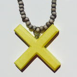 Yellow Kiss Pendant on Grey Necklace