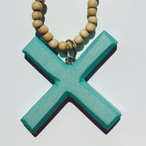 Cyan Kiss Pendant on Natural Necklace