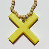 Yellow Kiss Pendant on Natural Necklace